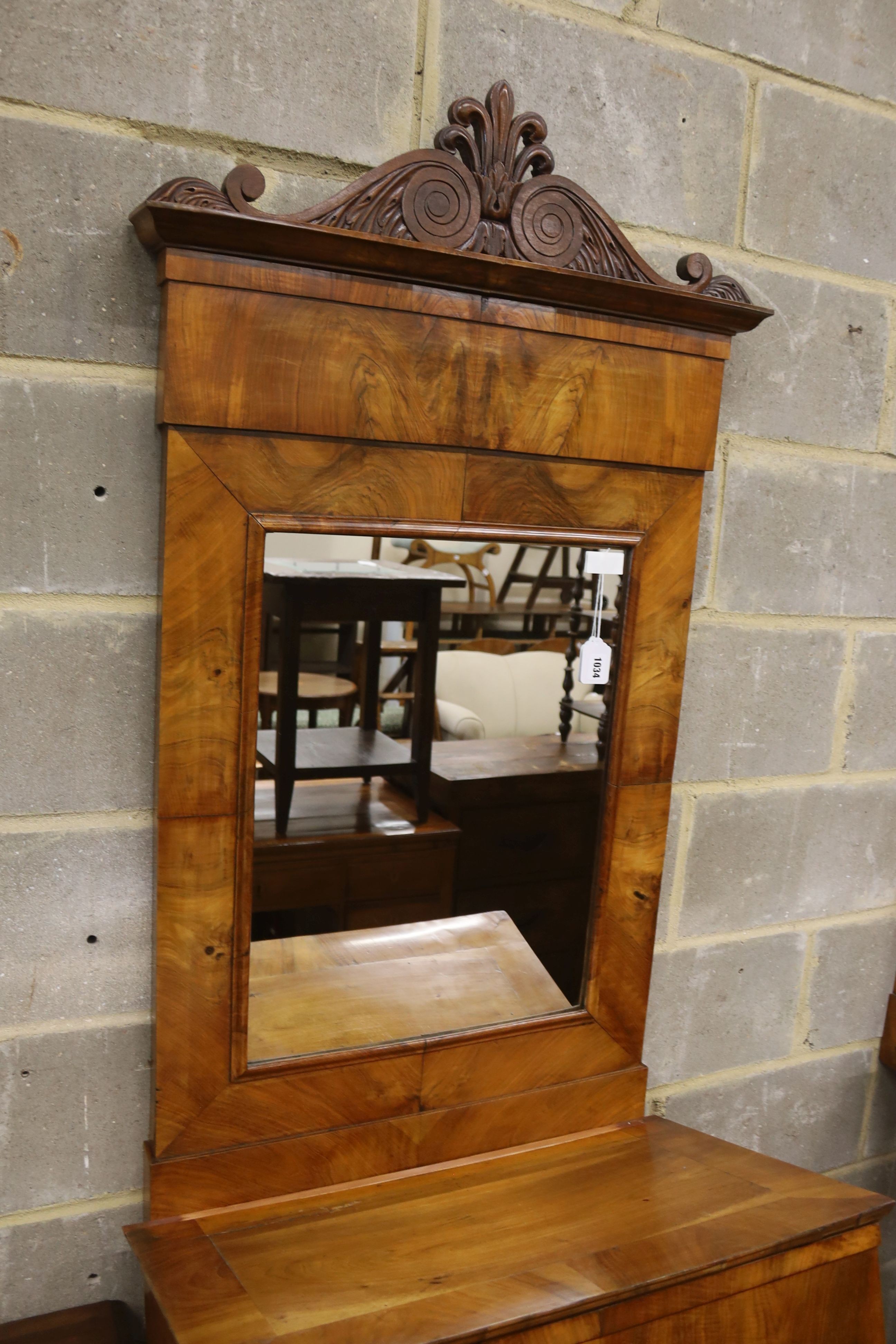 A pair of 19th century Italian mahogany pier tables with mirrors, width 72cm, depth 42cm, height 218cm